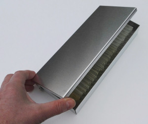 Aluminium microscope slide box slightly open Aluminium microscope slide box slightly open
